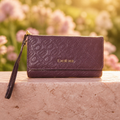 Celeste Debossed Trifold Wallet in Plum