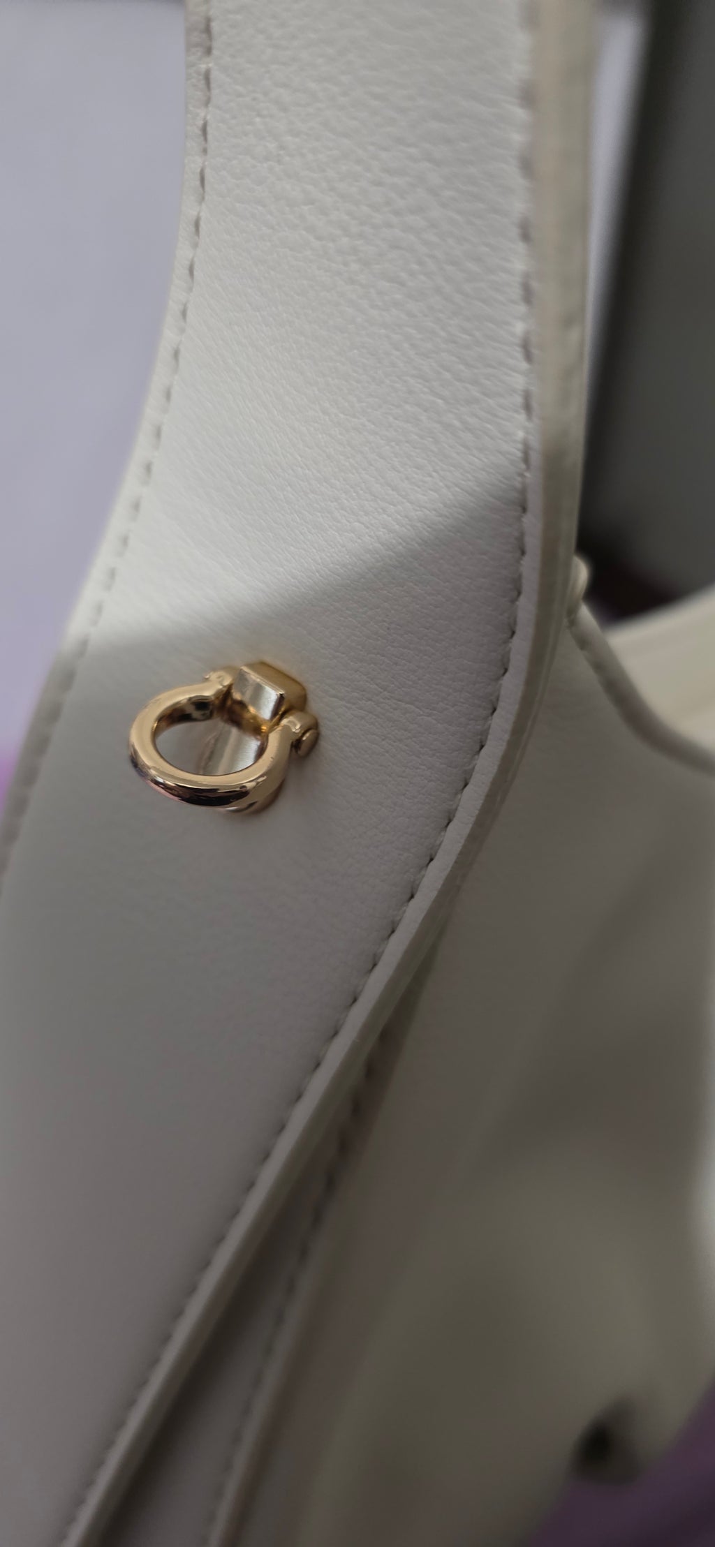 Izzy & Ali (cream) hobo style bag with crossbody strap.
